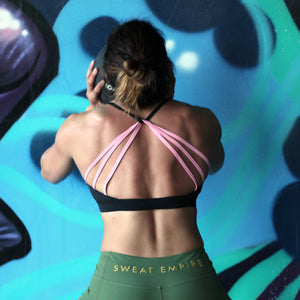 Trident black and pink sports bra back in action